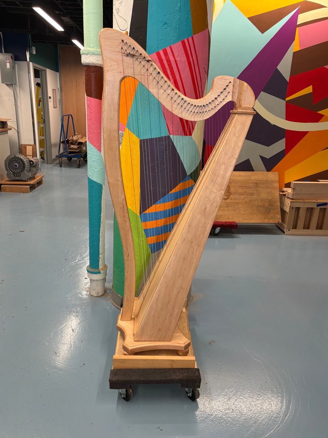 The finished 34-string lever harp, strung, on display at the Hobby Shop